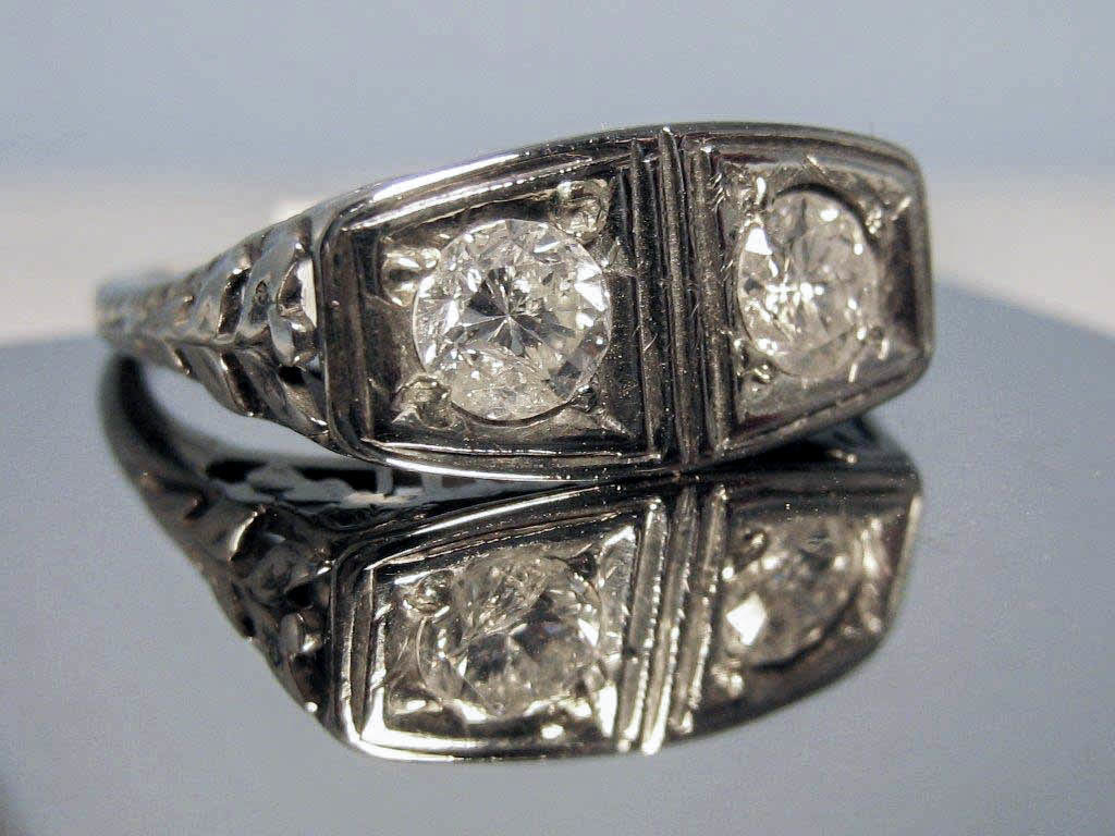 LP1131 18K White Gold 2 Stone Diamond Ring. Size 6.5 $1250. GIA appraisal included.