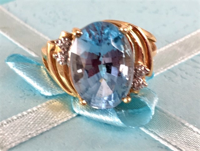 Estate Jewelry Nashville Franklin TN LP2299. Novembers' birthstone is the gorgeous sea blue topaz accented with diamonds. The cut draws your eyes right into the depth of the stone. $365