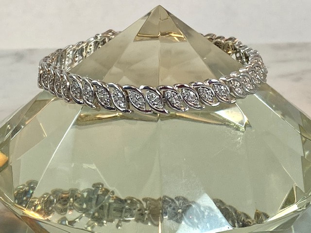 Estate Jewelry Nashville Franklin TN L1981. Estate Two Tone Diamond Bracelet. 1.05 Total Carat Weight Set in 10k with 70 Diamonds. $1395.00